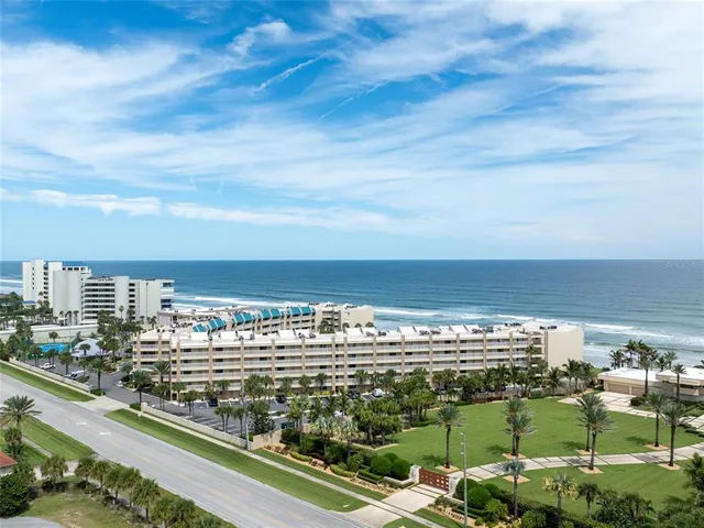 a view of a city with an ocean view
