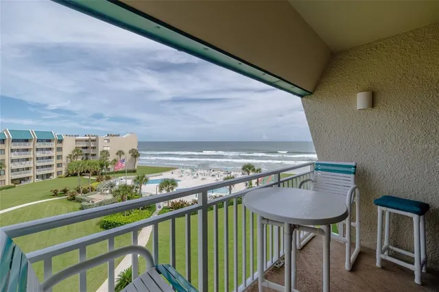 a view of balcony with furniture and outdoor space