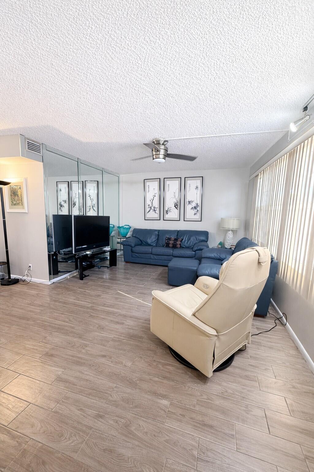 3030 Wolverton East Boca Raton, FL 33434 - Photo 2 of 13 a living room with furniture and a window