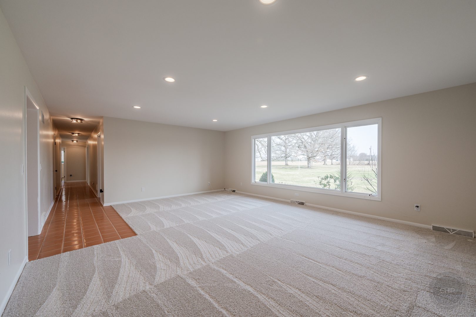15600 Griswold Springs Road Plano, IL 60545 - Photo 13 of 96 a view of an empty room with a window