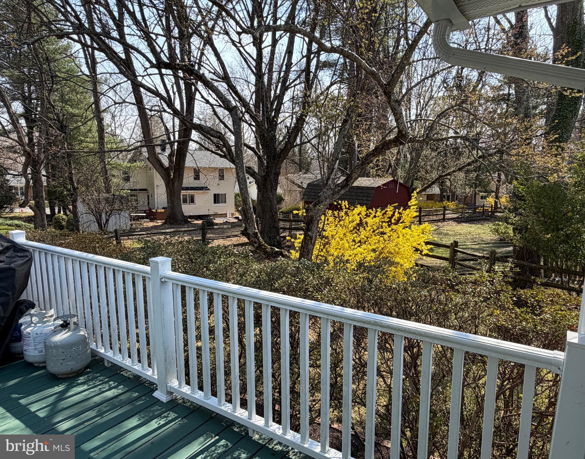 5033 Three Kings Lane Columbia, MD 21044 - Photo 13 of 38 Deck Overlooking Side Yard