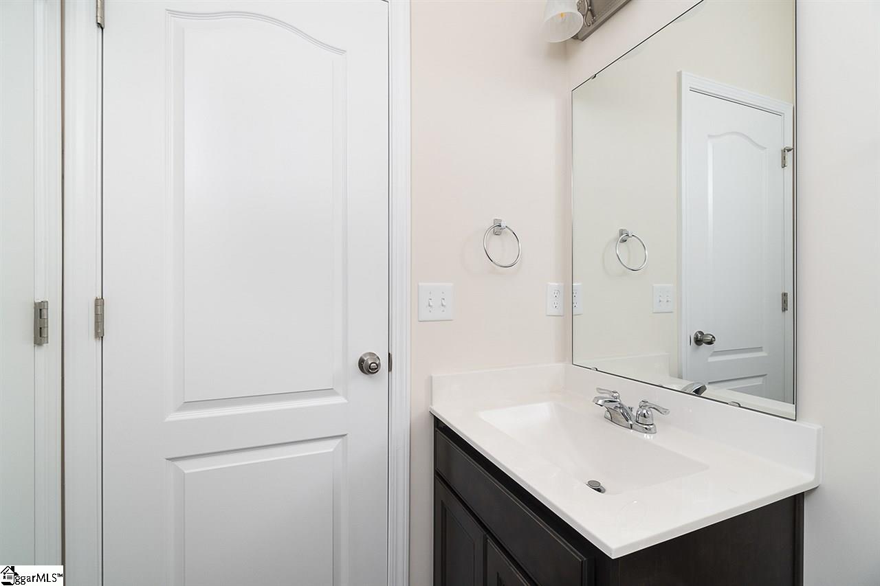 306 Skye Road Easley, SC 29642 - Photo 14 of 32 Downstairs full bath accessible from the hall and directly from bedroom 5