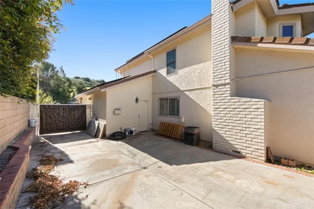 a backyard of a house with garage
