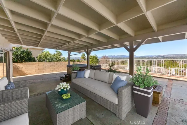 a outdoor living space with furniture and garden view