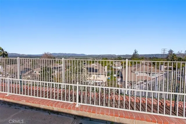 a view of city from a balcony