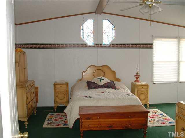 561 George Sherman Road Rougemont, NC 27572 - Photo 14 of 24 The master suite featres a 17.9 x 20.11 bedroom and two large full baths with HUGE closets