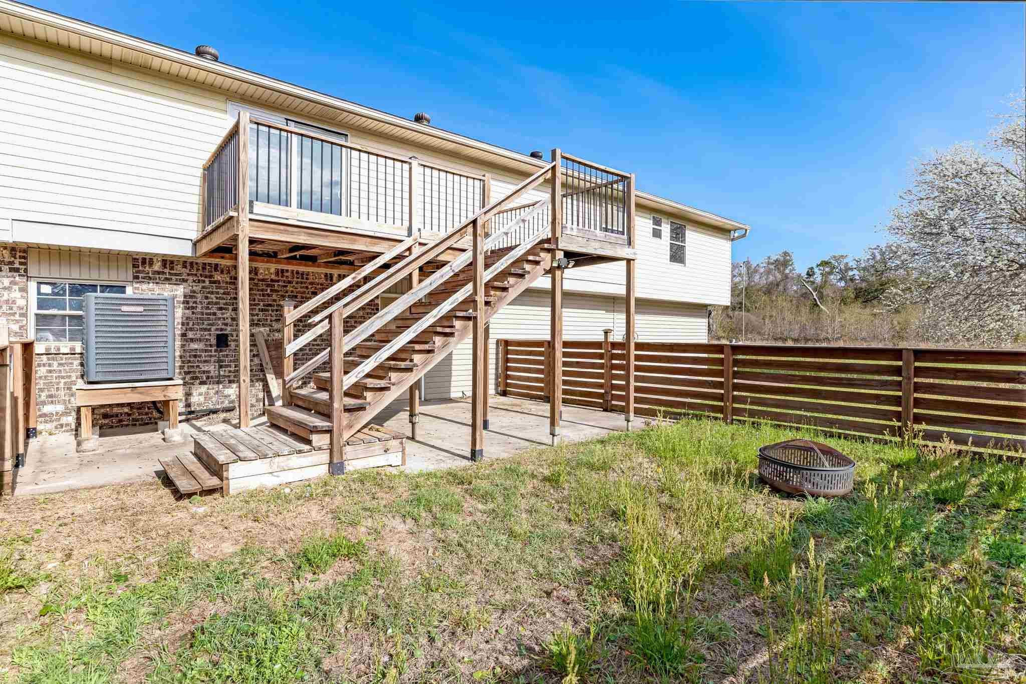 302 Garcon Point Road Milton, FL 32583 - Photo 46 of 51 a view of outdoor space and deck