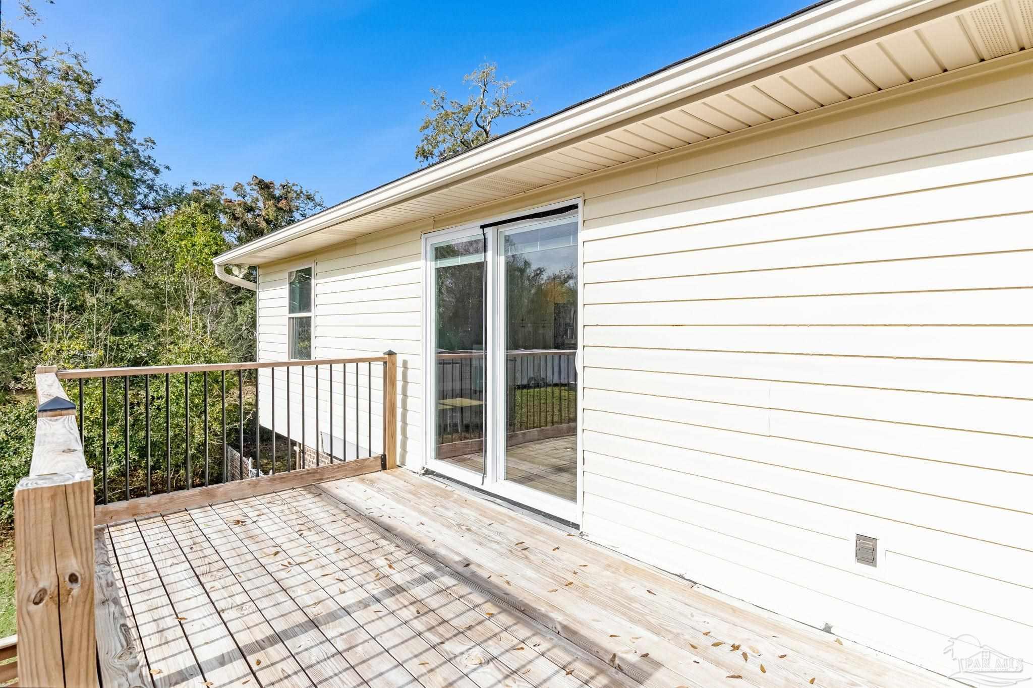 302 Garcon Point Road Milton, FL 32583 - Photo 49 of 51 a view of a house with a balcony