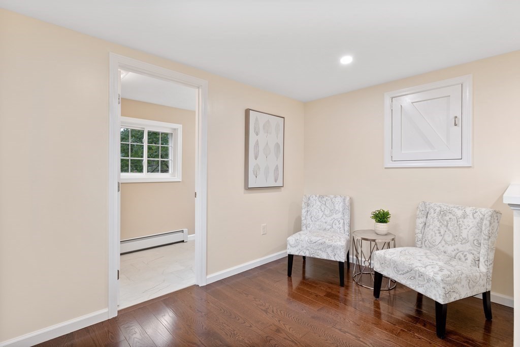 342 Great Road Stow, MA 01775 - Photo 16 of 33 a living room with furniture and a window