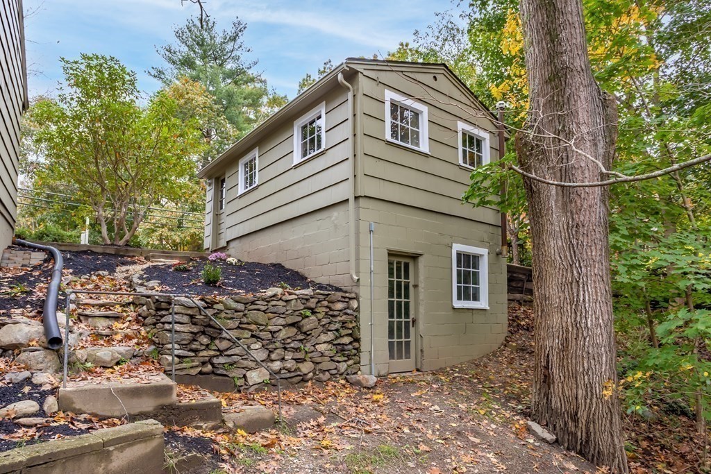 342 Great Road Stow, MA 01775 - Photo 32 of 33 a view of a house with a tree