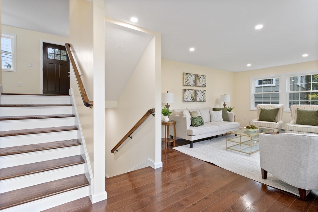 342 Great Road Stow, MA 01775 - Photo 9 of 33 a living room with furniture and a wooden floor