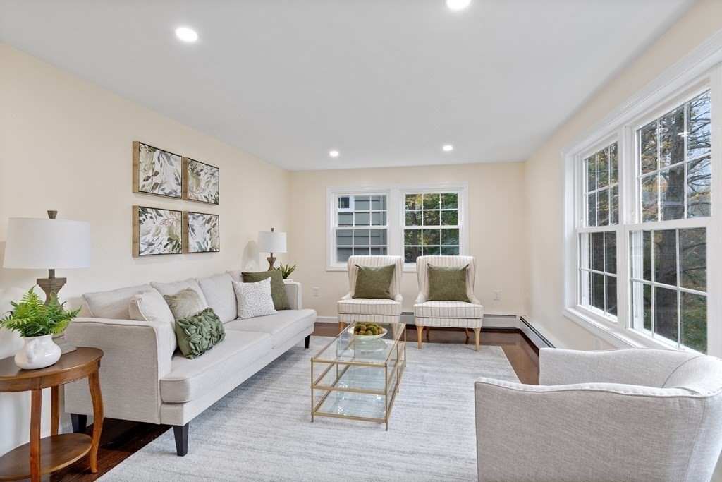 342 Great Road Stow, MA 01775 - Photo 10 of 33 a living room with furniture and large windows