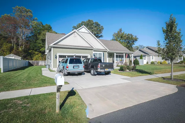 a house view with a garden space