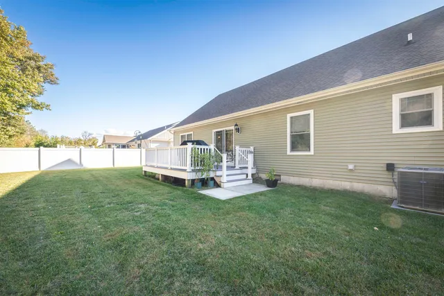 a view of a house with a back yard