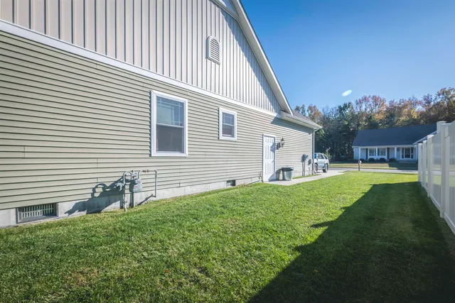 a view of backyard with a garden and entertaining space