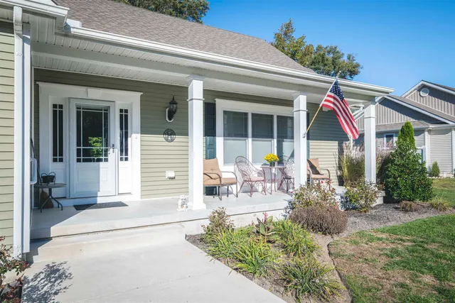 a front view of a house with patio