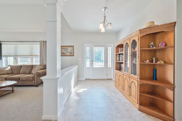 a view of livingroom with furniture and windows