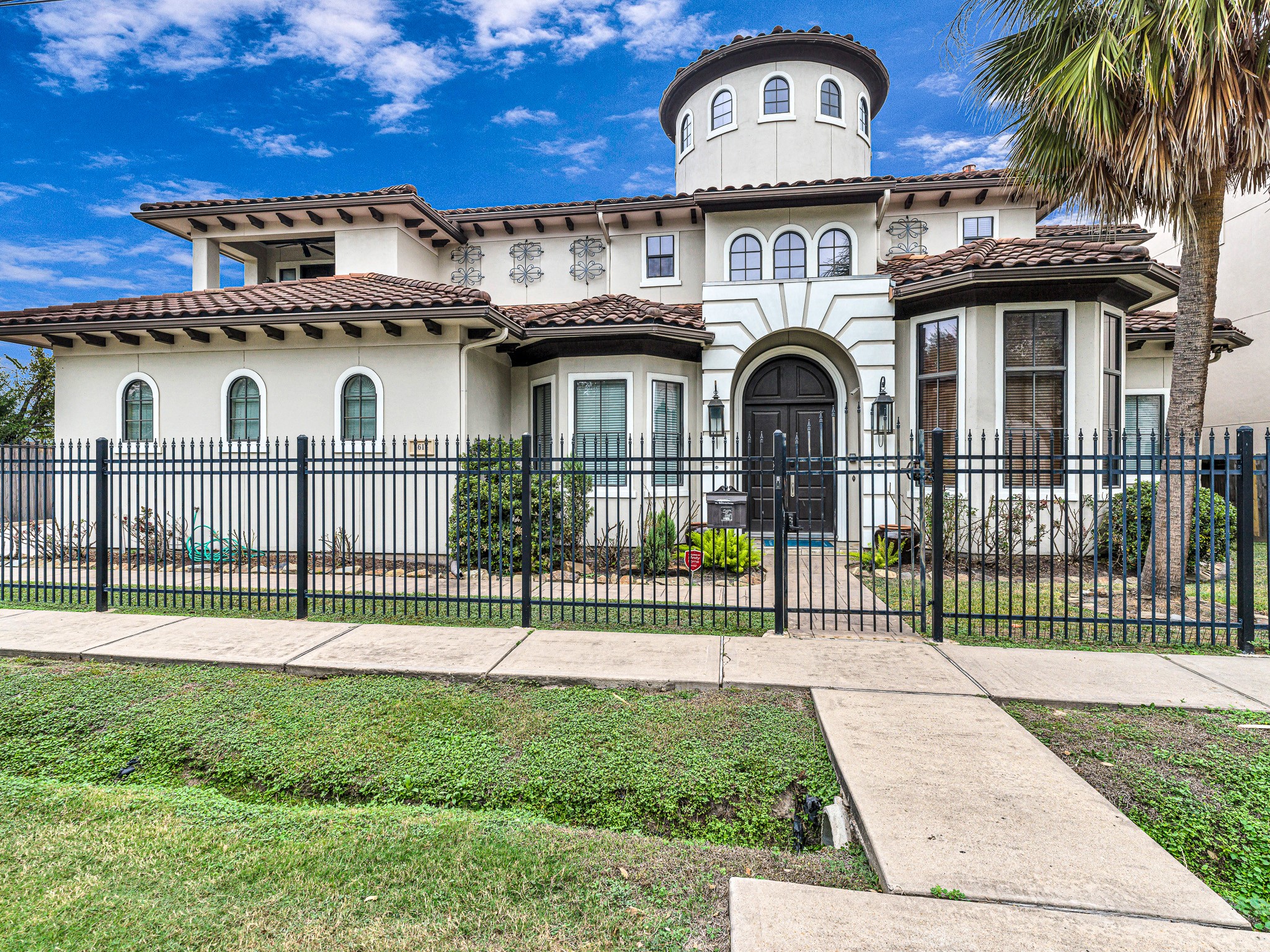 4614 Inker Street Houston, TX 77007 - Photo 1 of 36 This stunning two-story home features a unique turret, elegant arches, a gated entry, and large windows for natural light.