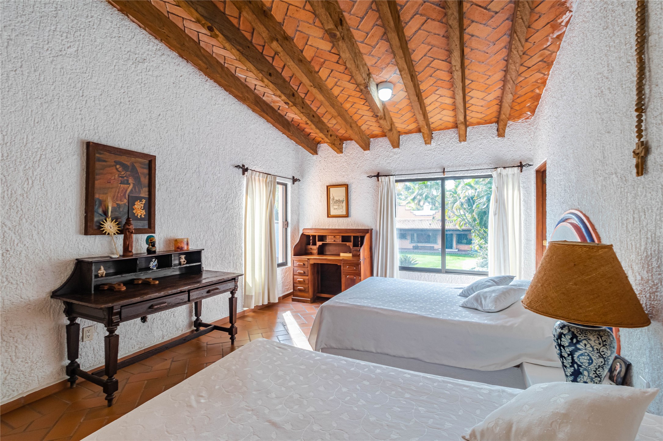 Llamarada Rochester, undefined 62563 - Photo 40 of 50 a bedroom with a bed and a window