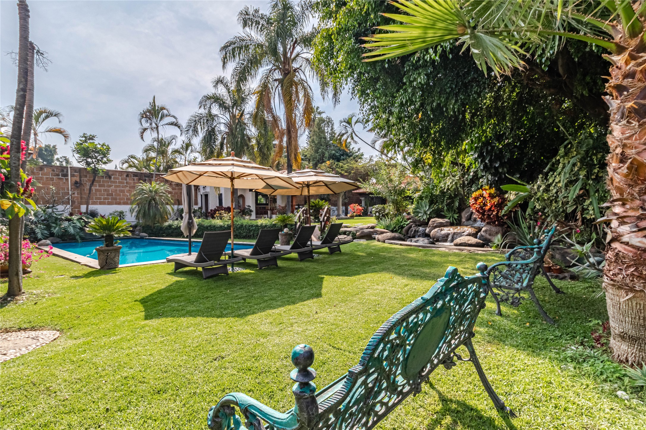 Llamarada Rochester, undefined 62563 - Photo 4 of 50 a view of swimming pool with lawn chairs and a yard