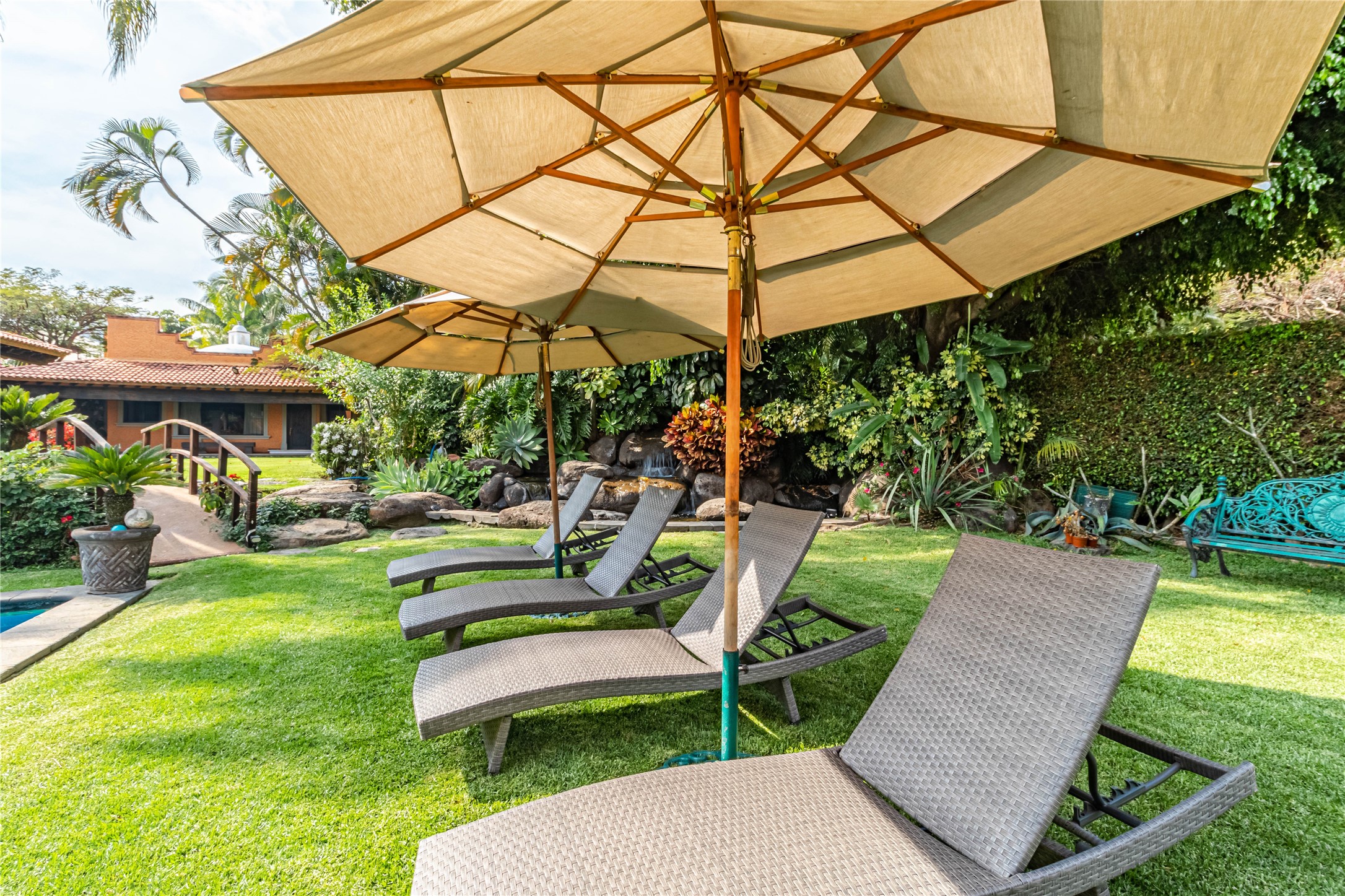 Llamarada Rochester, undefined 62563 - Photo 7 of 50 a view of a backyard with table and chairs under an umbrella
