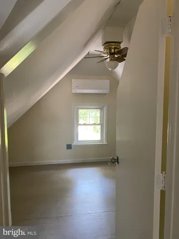 a view of a livingroom with a staircase