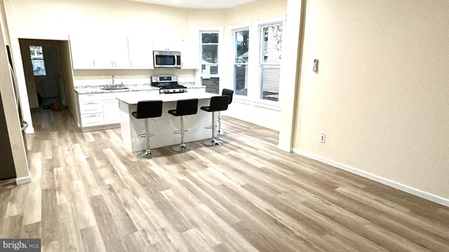 a view of a living room with a flat screen tv