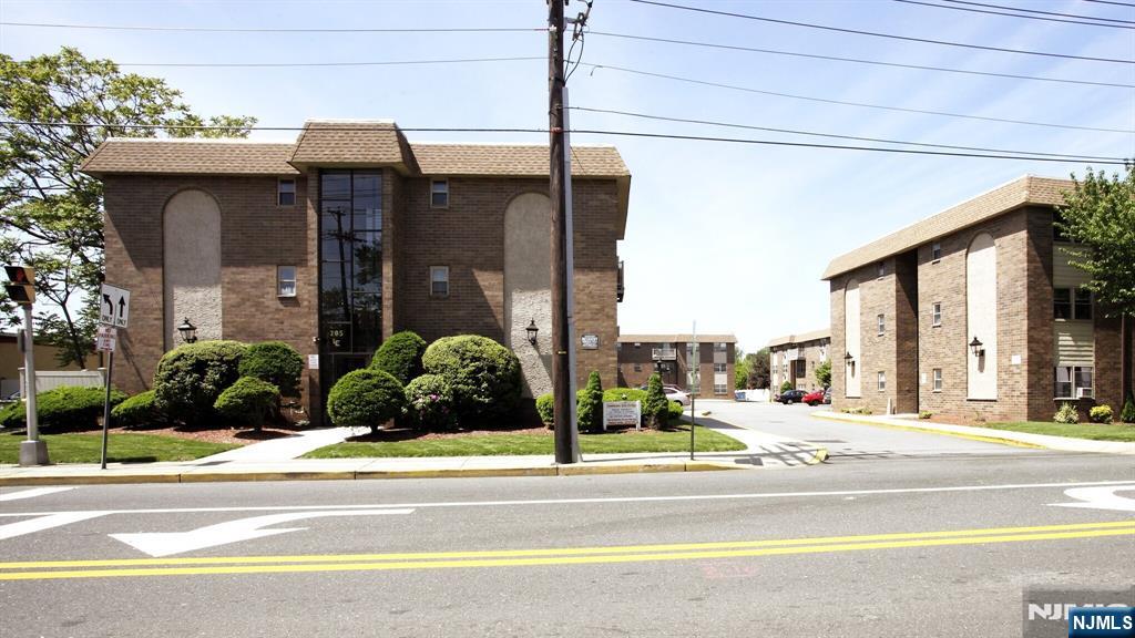 a view of a building with a street