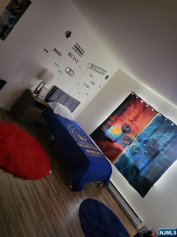 205 Bergen Turnpike, Unit 2A Ridgefield Park, NJ 07660 - Photo 12 of 13 view of living room with furniture and screen