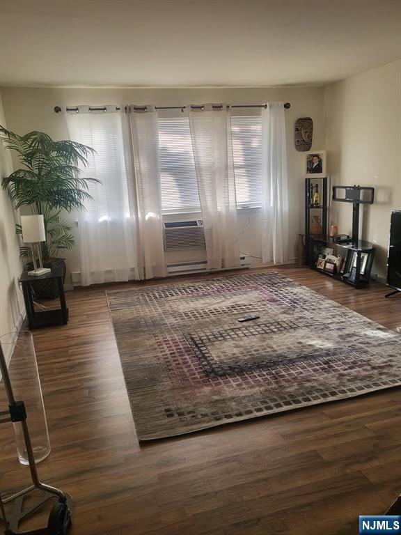 205 Bergen Turnpike, Unit 2A Ridgefield Park, NJ 07660 - Photo 6 of 13 a view of a livingroom with wooden floor and a couch