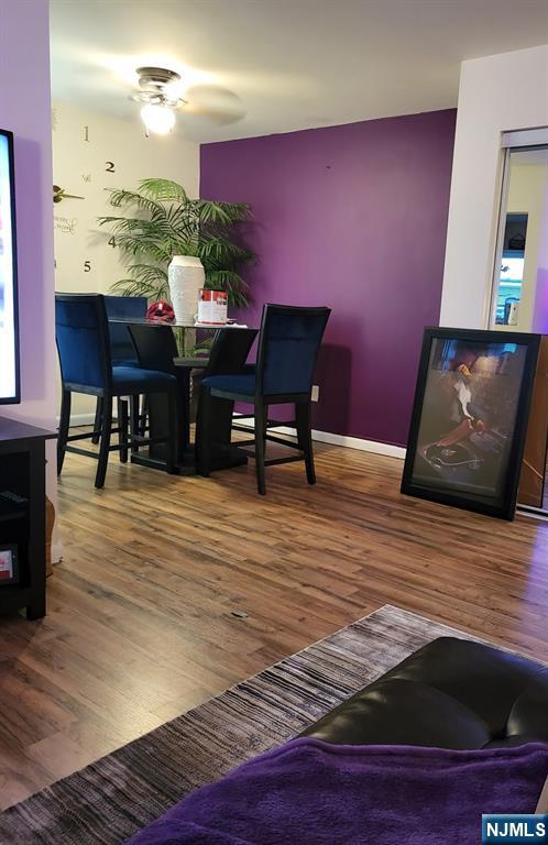 205 Bergen Turnpike, Unit 2A Ridgefield Park, NJ 07660 - Photo 8 of 13 a view of a dining room with furniture and wooden floor