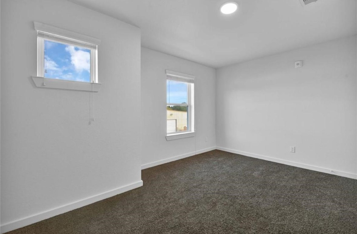12603 Telge Road, Unit 28C Cypress, TX 77429 - Photo 16 of 25 an empty room with windows