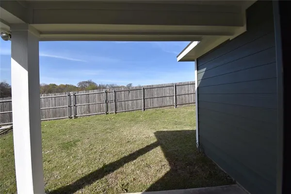 a view of outdoor space and yard