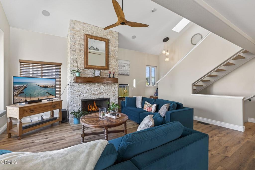 116 Pasadena Avenue Oxnard, CA 93035 - Photo 12 of 52 a living room with furniture and a fireplace