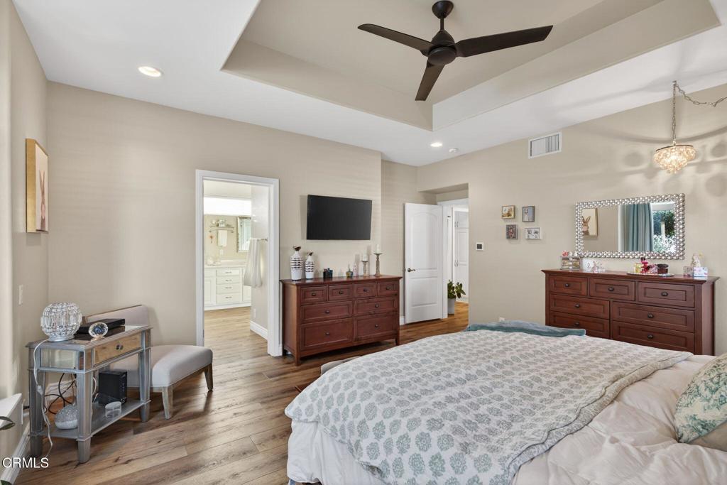 116 Pasadena Avenue Oxnard, CA 93035 - Photo 27 of 52 a bed room with a bed and a television