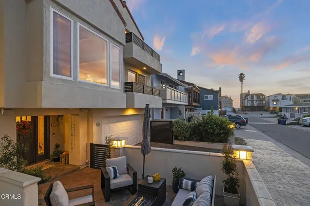 a view of a building with sitting area