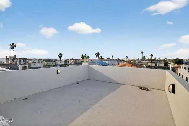 a kitchen with a sink and a stove
