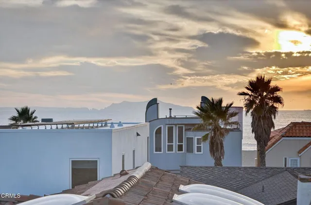 a view of a entryway with flower plants