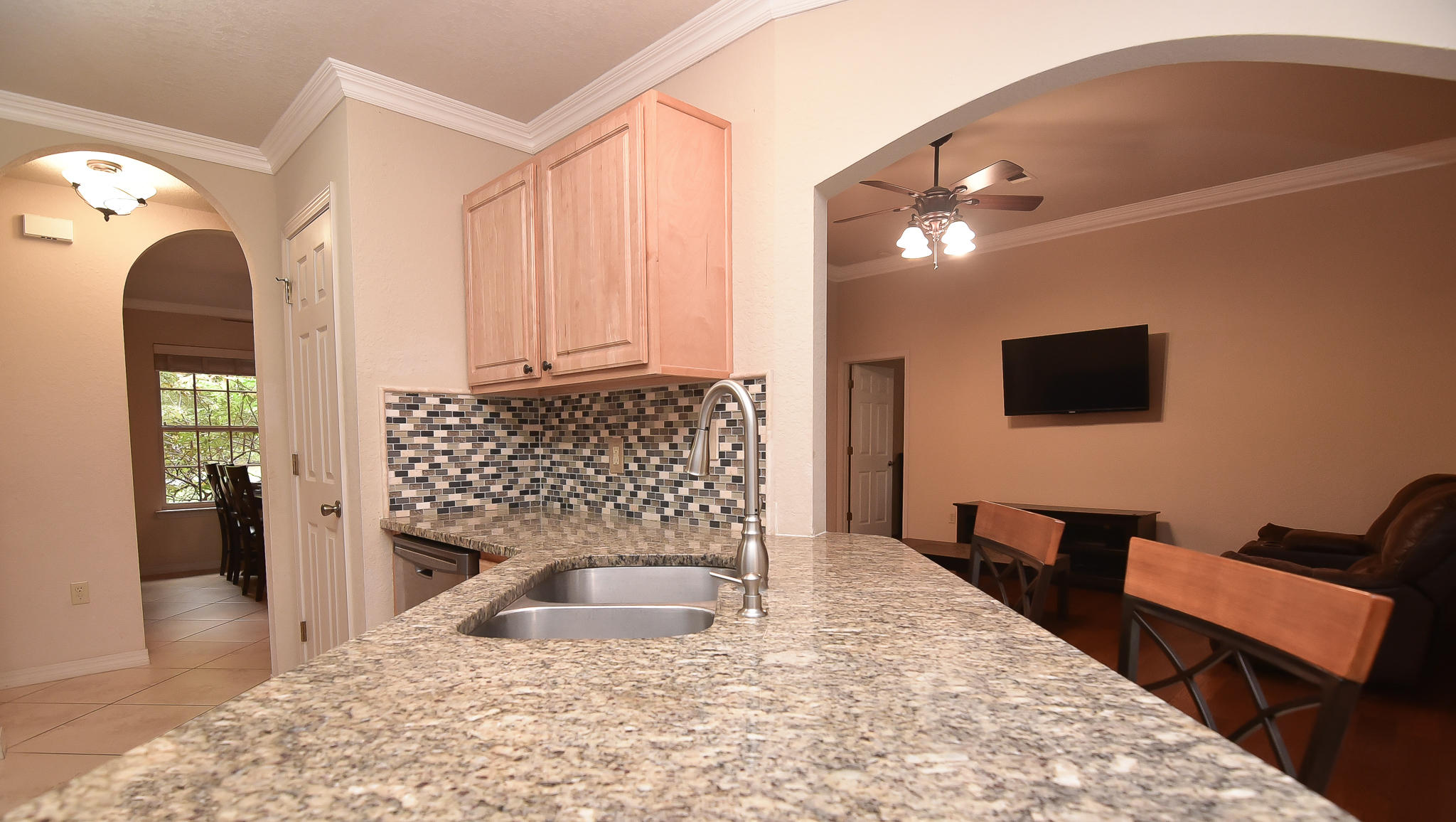4214 Painter Branch Road Crestview, FL 32539 - Photo 17 of 41 a view of a livingroom with furniture and a flat screen tv