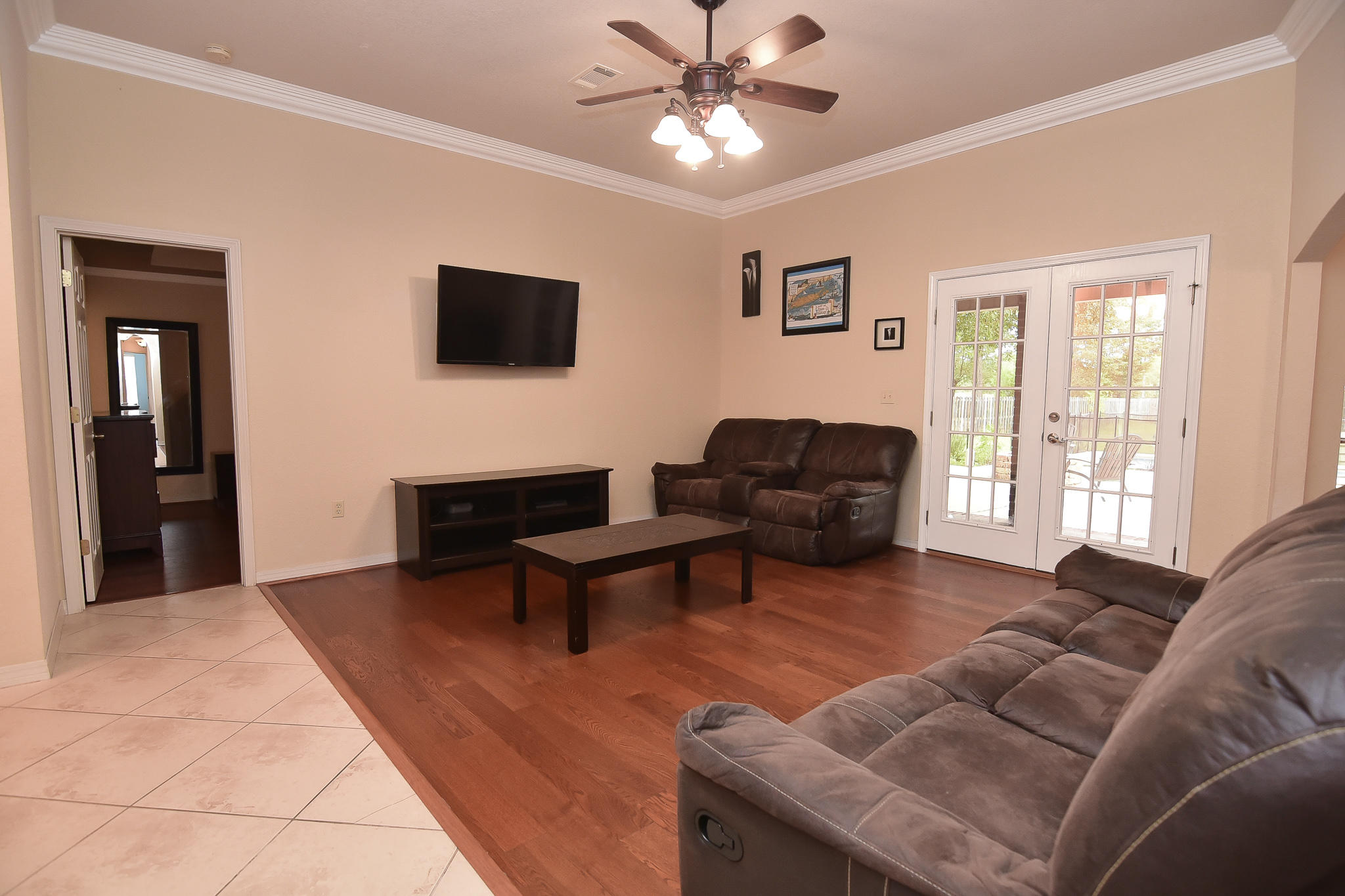 4214 Painter Branch Road Crestview, FL 32539 - Photo 20 of 41 a living room with furniture a ceiling fan and a window