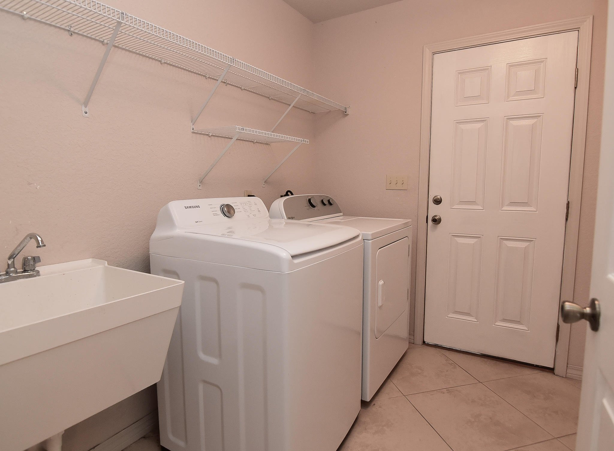 4214 Painter Branch Road Crestview, FL 32539 - Photo 21 of 41 a utility room with dryer and washer