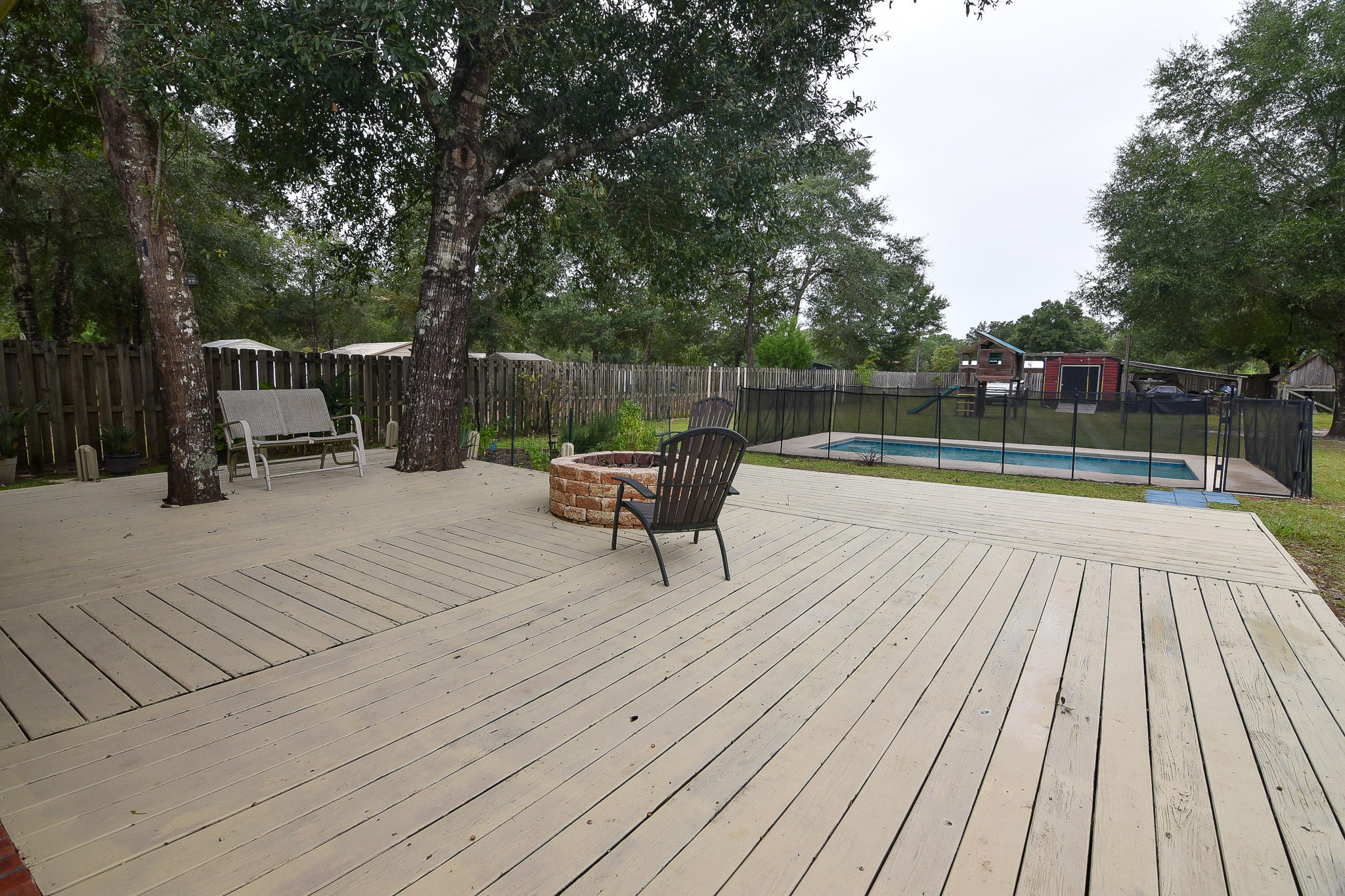 4214 Painter Branch Road Crestview, FL 32539 - Photo 31 of 41 swimming pool view with a seating space