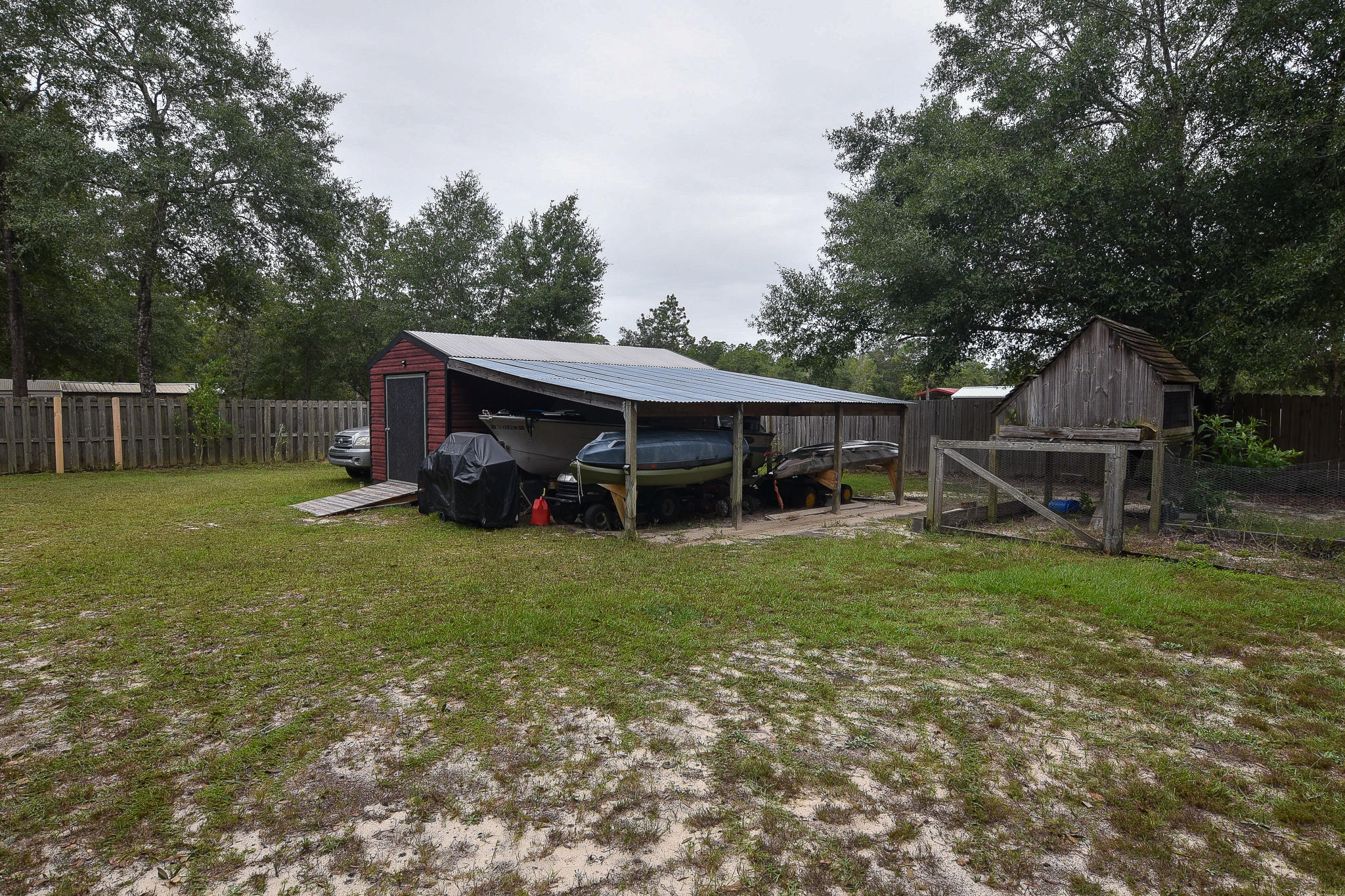 4214 Painter Branch Road Crestview, FL 32539 - Photo 34 of 41 a front view of a house with garden