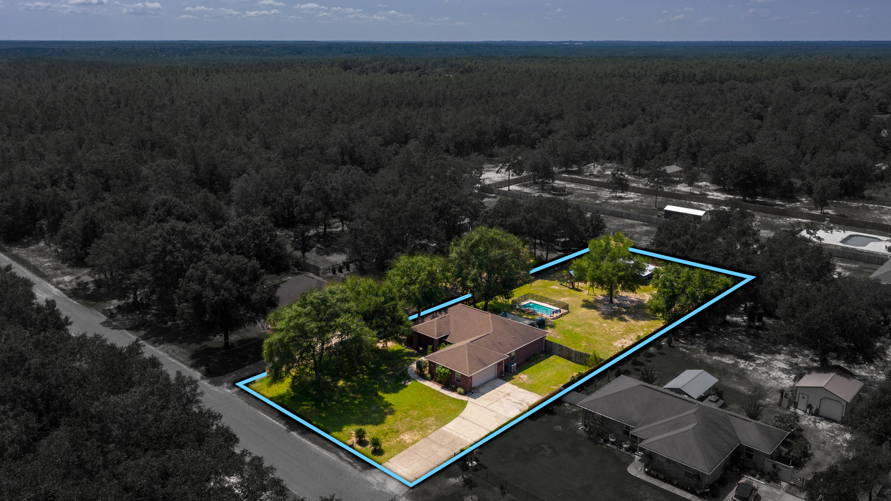 4214 Painter Branch Road Crestview, FL 32539 - Photo 39 of 41 an aerial view of house with yard