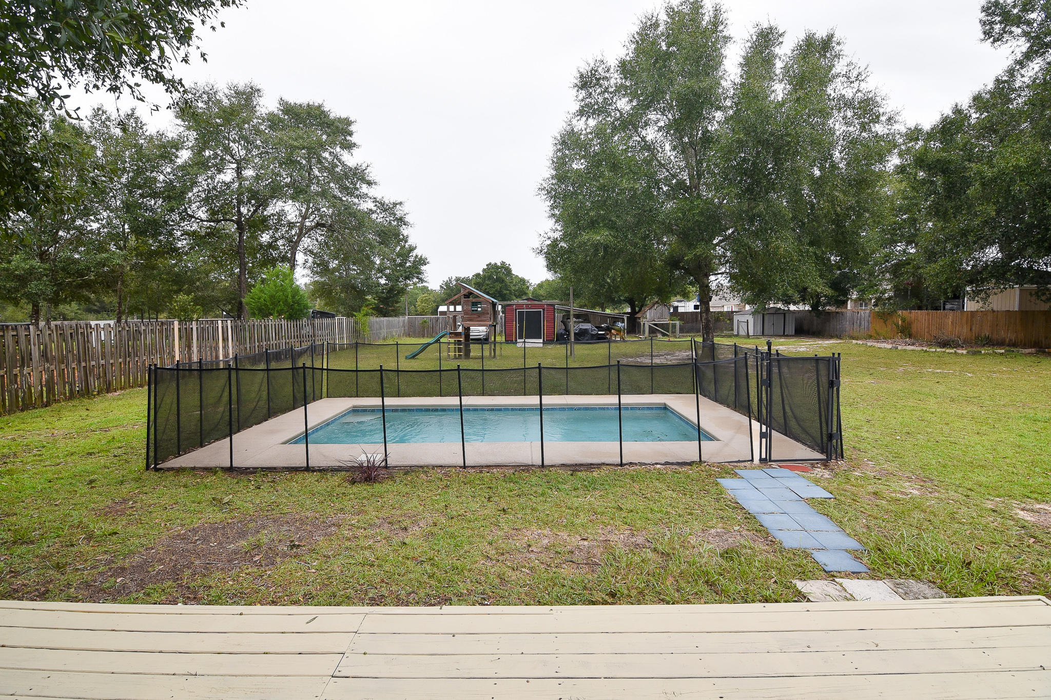 4214 Painter Branch Road Crestview, FL 32539 - Photo 5 of 41 a view of a park with large trees