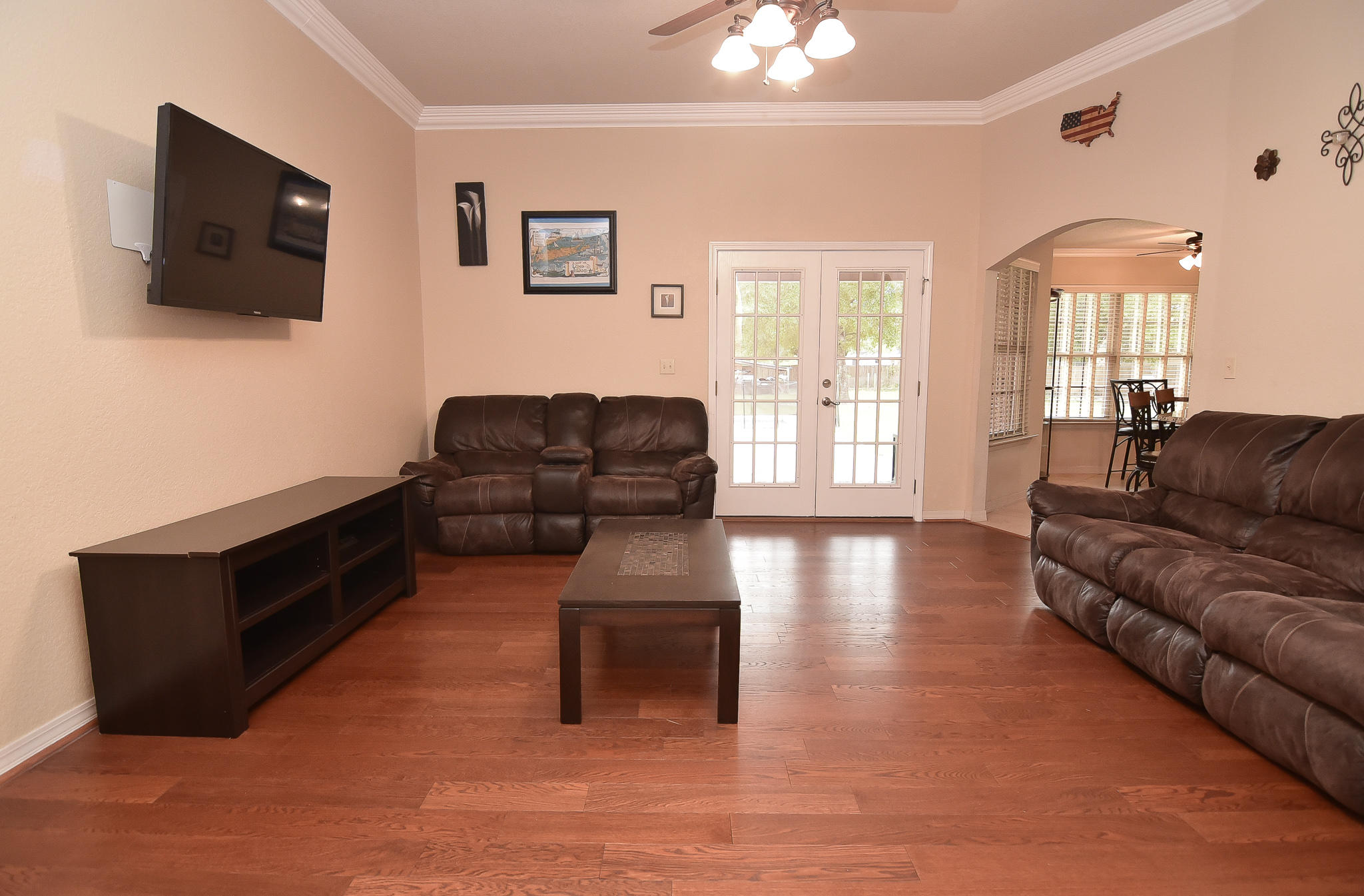 4214 Painter Branch Road Crestview, FL 32539 - Photo 6 of 41 a living room with furniture and a flat screen tv