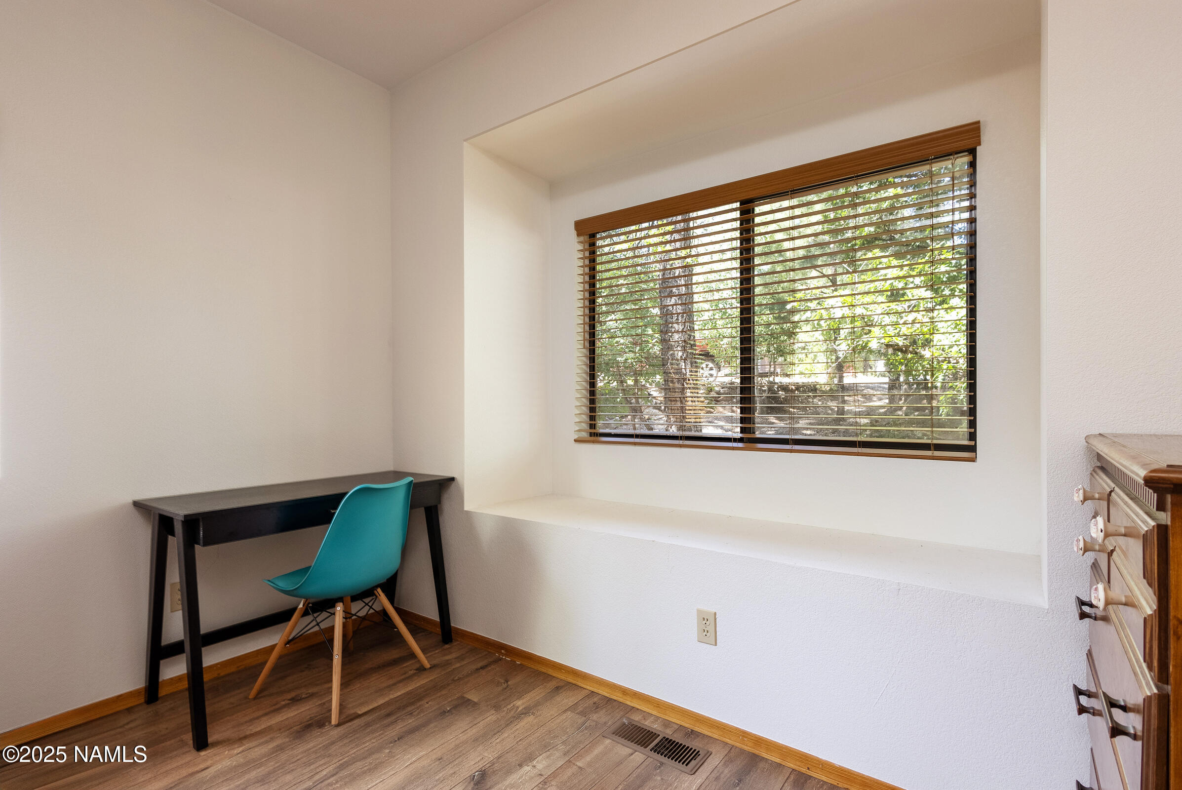 335 Sandia Circle Munds Park, AZ 86017 - Photo 16 of 34 a view of a workspace with furniture and a window