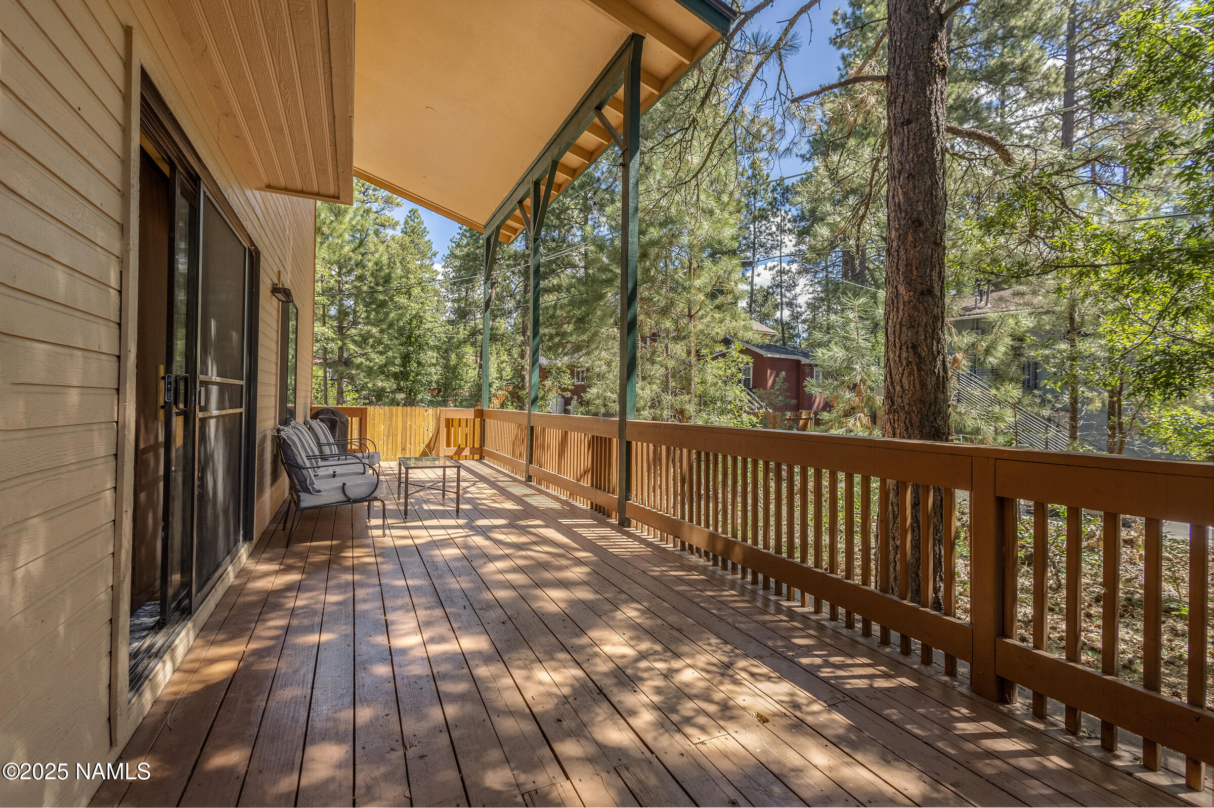 335 Sandia Circle Munds Park, AZ 86017 - Photo 2 of 34 a view of a two chairs in the balcony