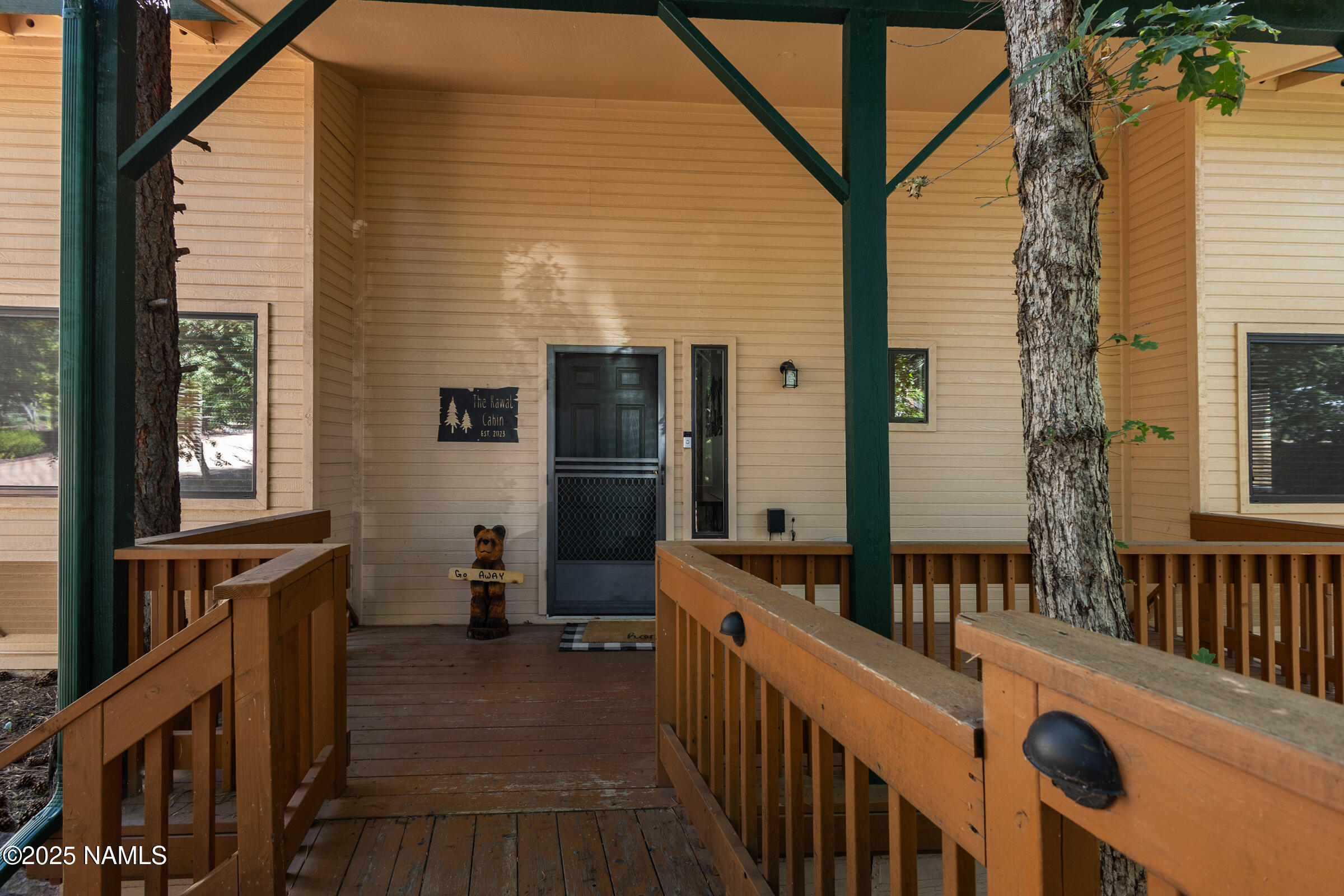 335 Sandia Circle Munds Park, AZ 86017 - Photo 26 of 34 a view of a house with wooden deck