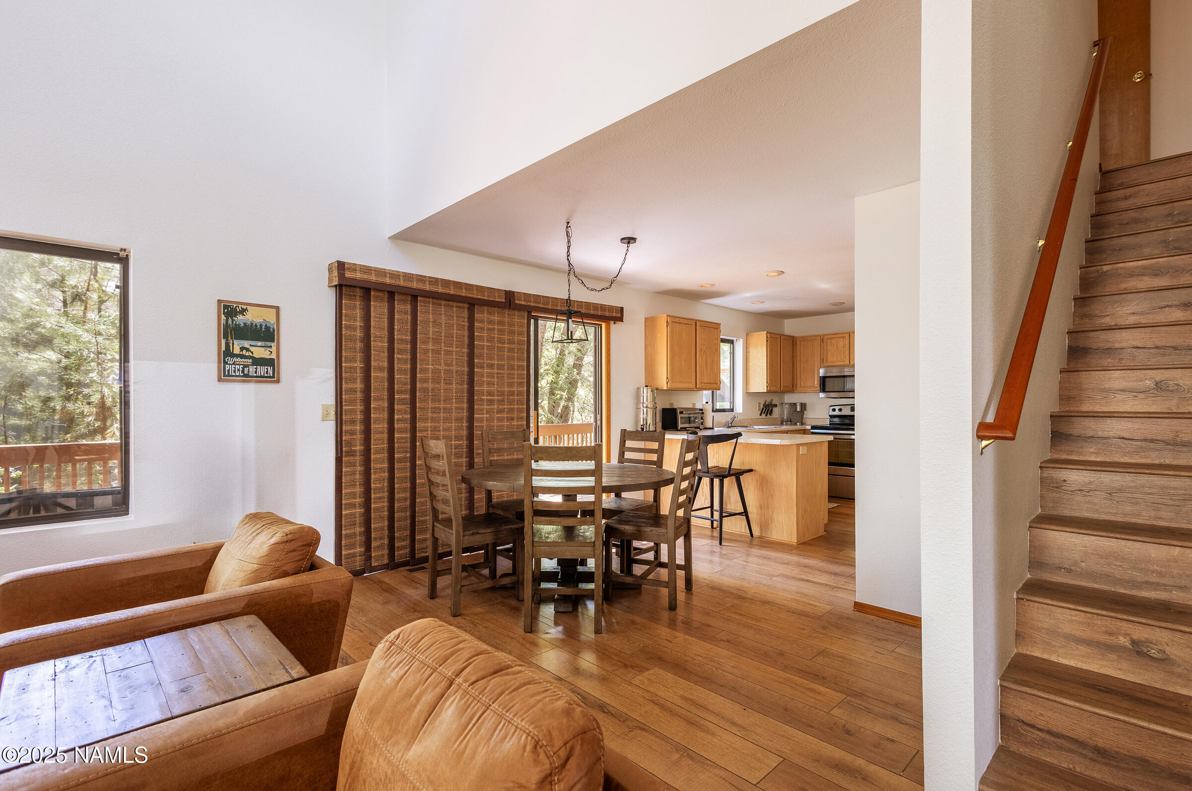 335 Sandia Circle Munds Park, AZ 86017 - Photo 9 of 34 a living room with furniture and wooden floor
